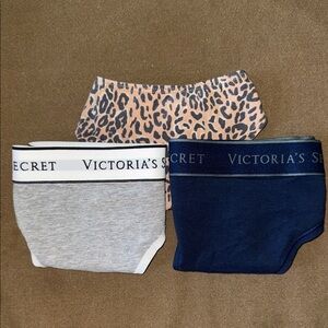NWT bundle of 3 pair Victoria's Secret Leopard, Navy, and Gray Panty Trio size L
